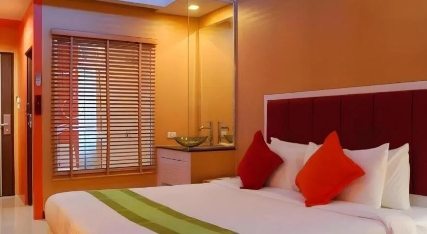 Bed in V-One Hotel Korat