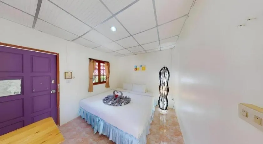 Bed in Phangan Cabana Resort