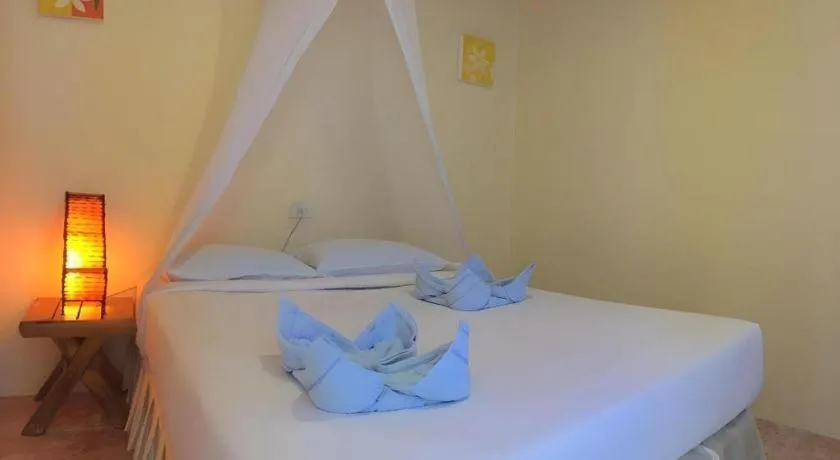 Bed in Phangan Cabana Resort
