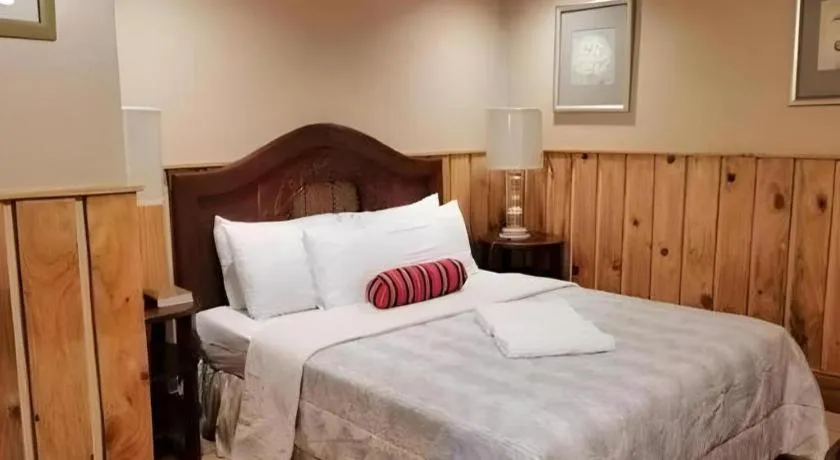 Bed in Mountain Lodge Hotel and Restaurant