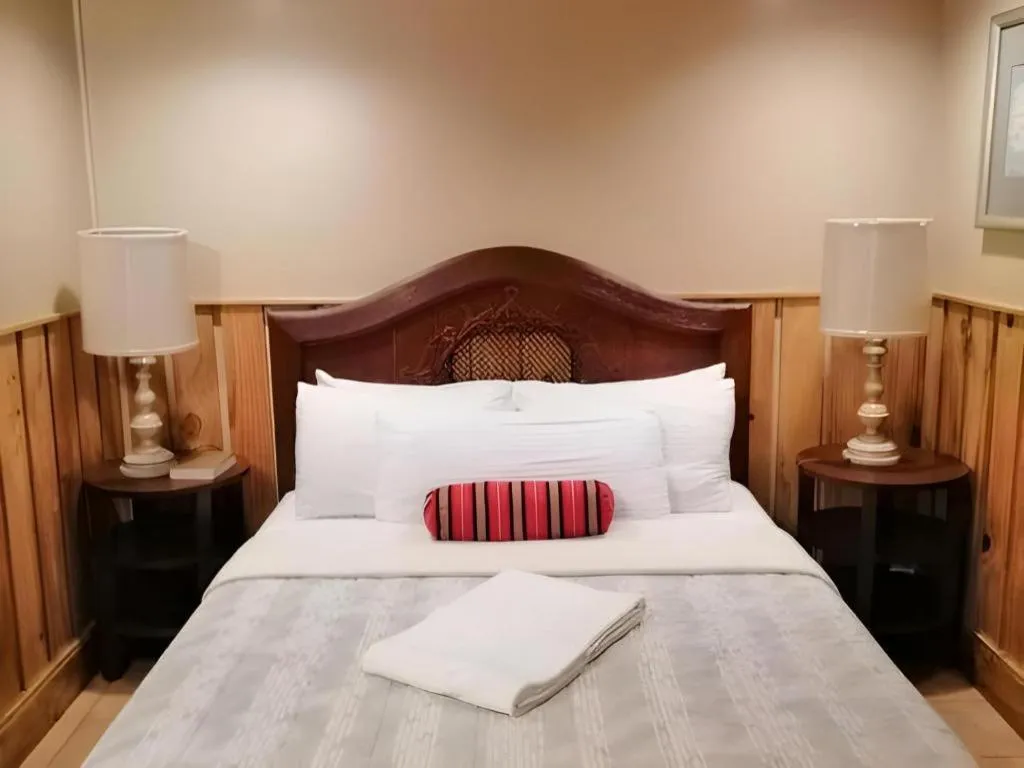 Bed in Mountain Lodge Hotel and Restaurant