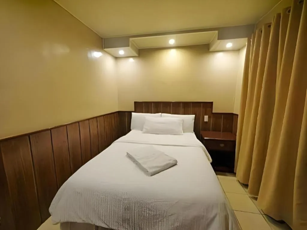 Bed in Mountain Lodge Hotel and Restaurant