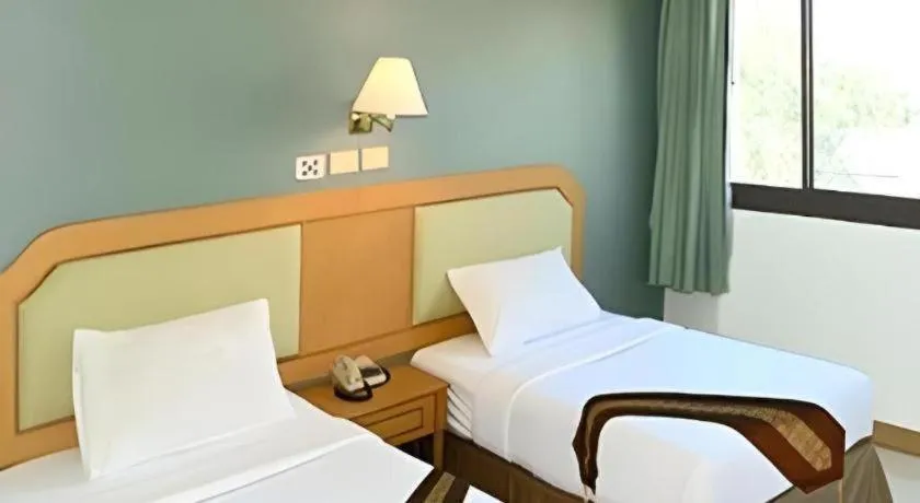 Bed in The Park Hotel Pattaya