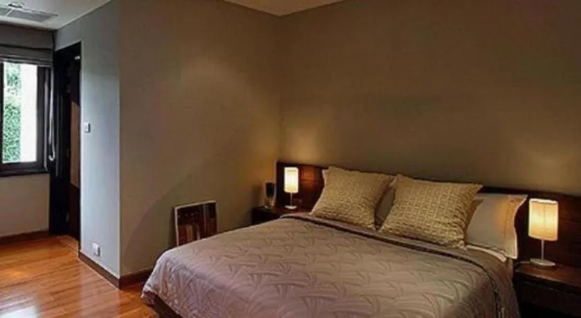 Bed in Azaya Villas Resort