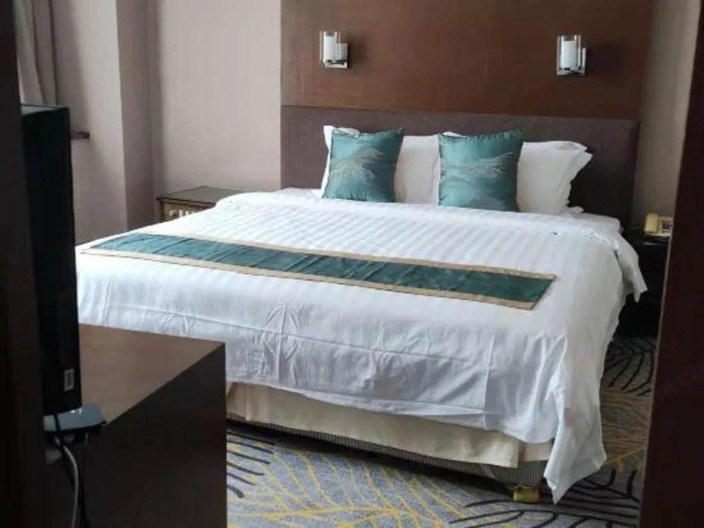 Bed in Poly Hotel
