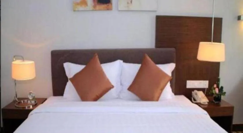 Bed in Poly Hotel