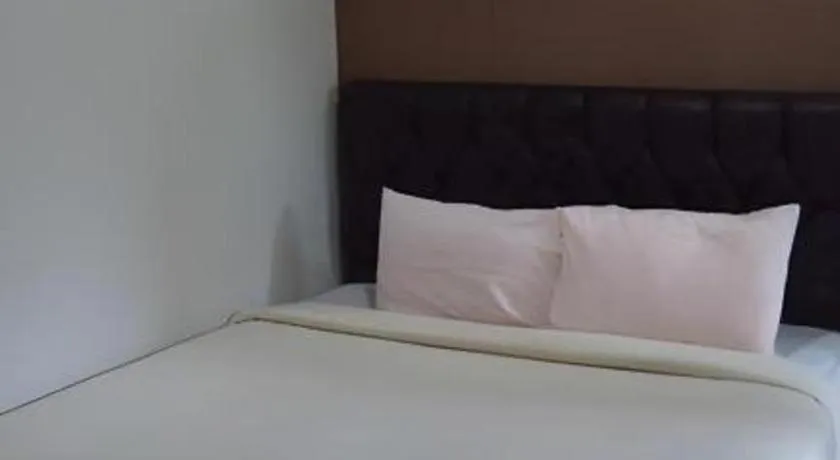 Bed in The Aroma's of Bali Hotel & Residence