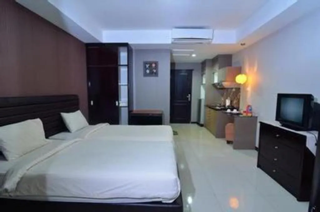 Bed in The Aroma's of Bali Hotel & Residence