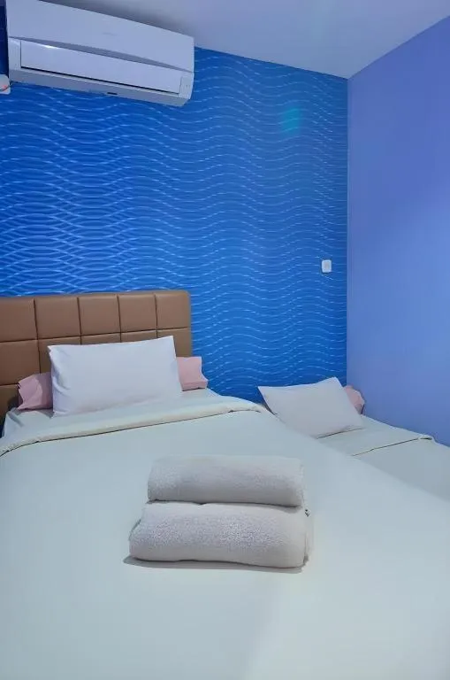 Bed in The Aroma's of Bali Hotel & Residence