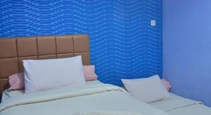 Bed in The Aroma's of Bali Hotel & Residence