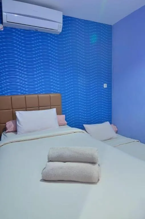 Bed in The Aroma's of Bali Hotel & Residence