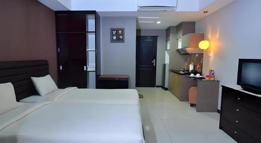 Bed in The Aroma's of Bali Hotel & Residence