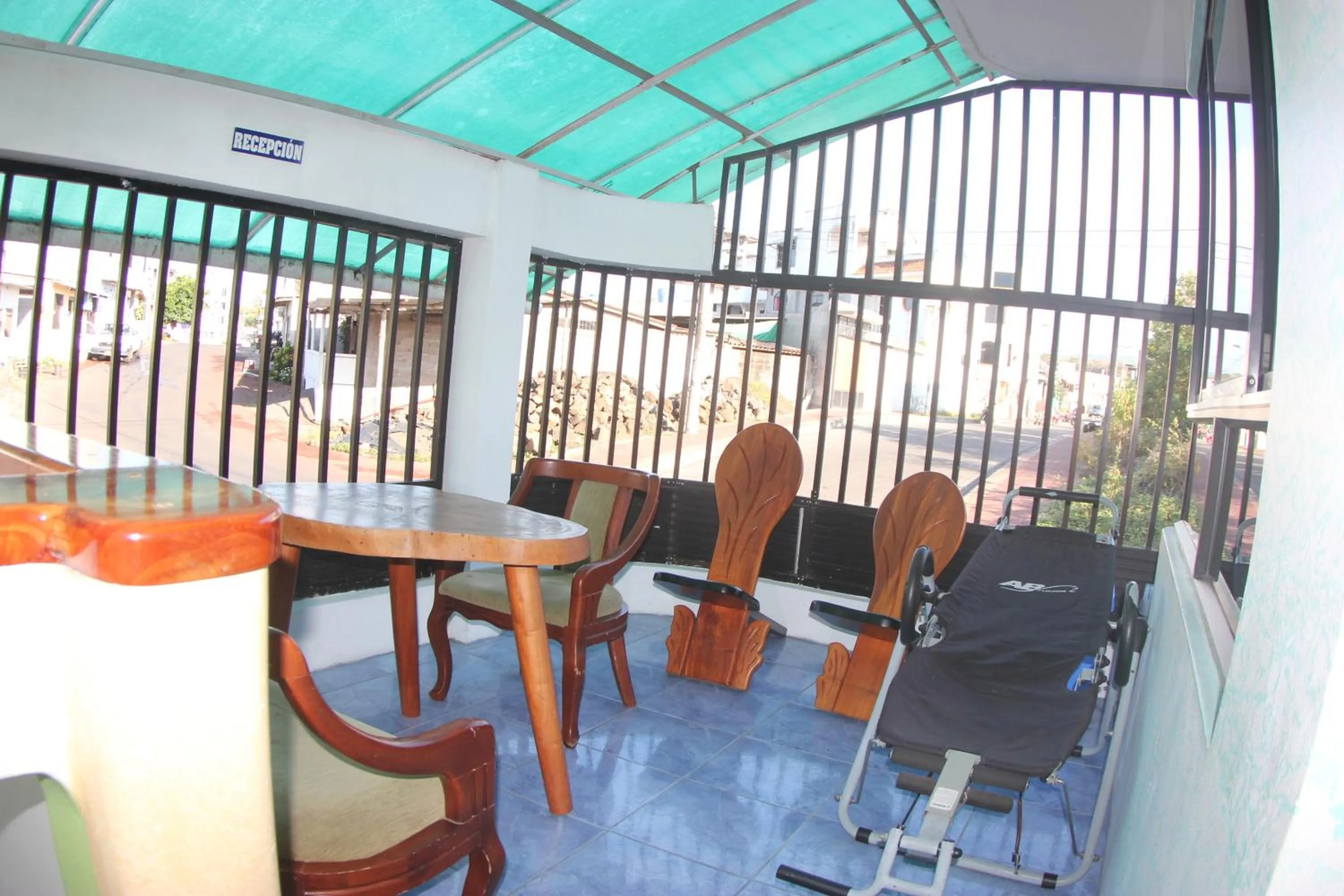 Communal lounge/ TV room in The Island Home