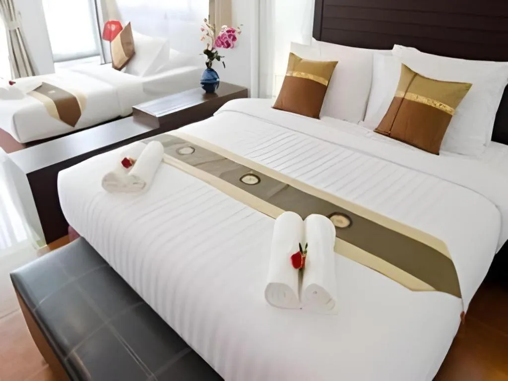 Bed in Nattha Waree Hot Spring Resort and Spa