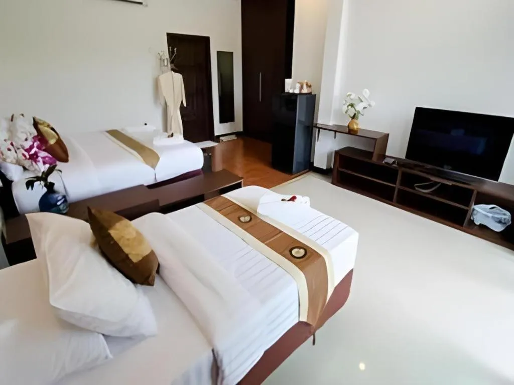 Bed in Nattha Waree Hot Spring Resort and Spa