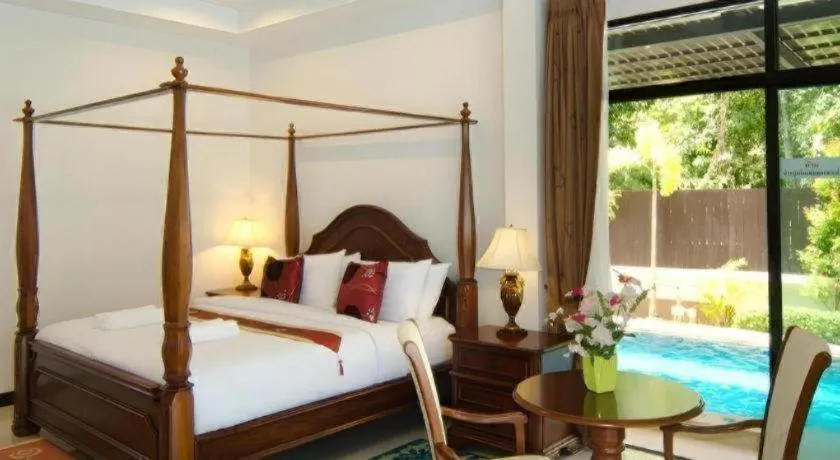 Bed in Nattha Waree Hot Spring Resort and Spa