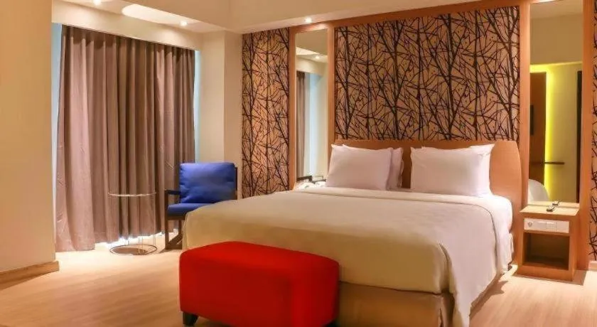 Bed in CLARO Makassar Hotel & Convention