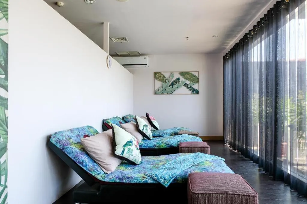 Bed in CLARO Makassar Hotel & Convention