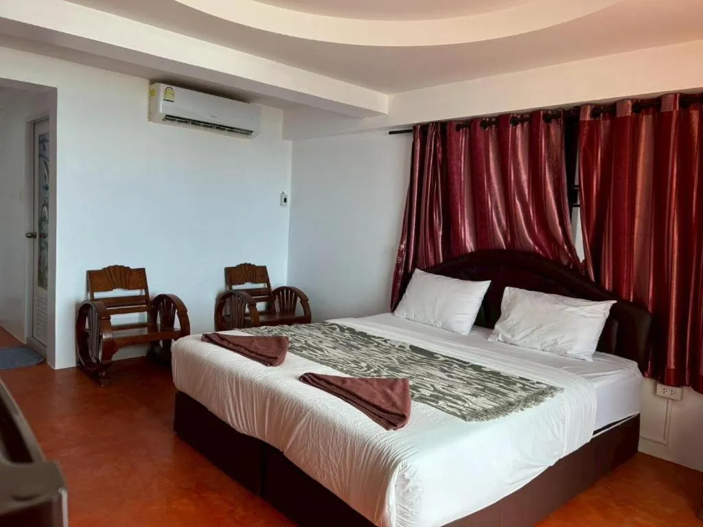 Bed in Jirawan Hotel