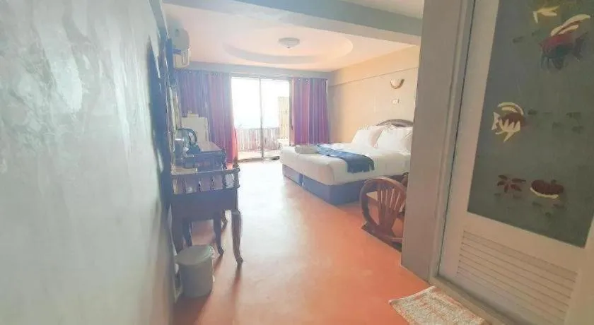 Bed in Jirawan Hotel