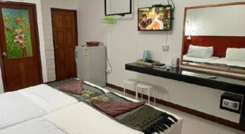 Bed in Jirawan Hotel