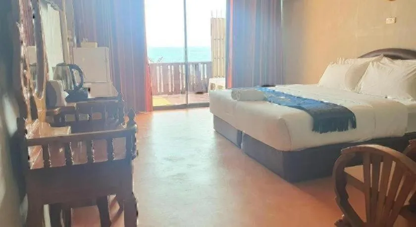 Bed in Jirawan Hotel