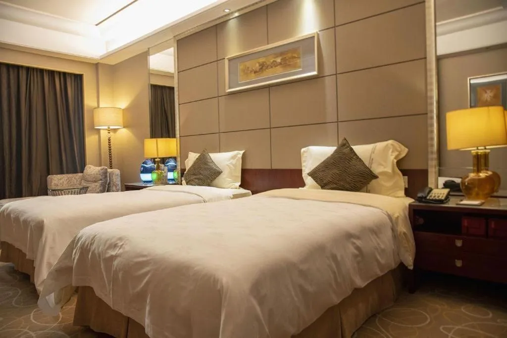 Bed in Wellton International Hotel