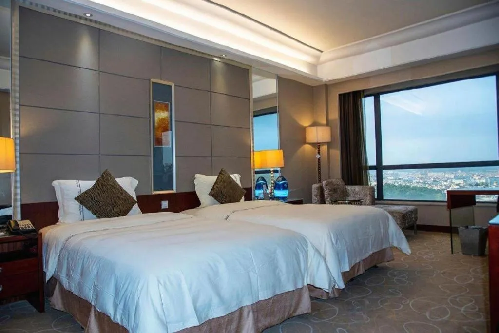 Bed in Wellton International Hotel