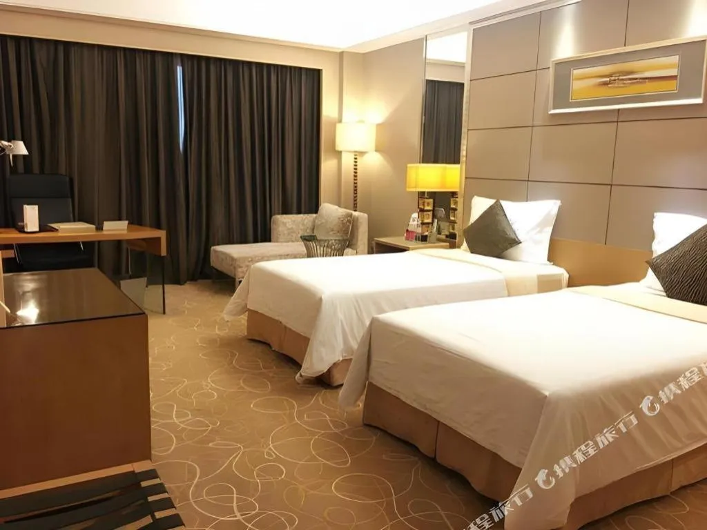 Bed in Wellton International Hotel