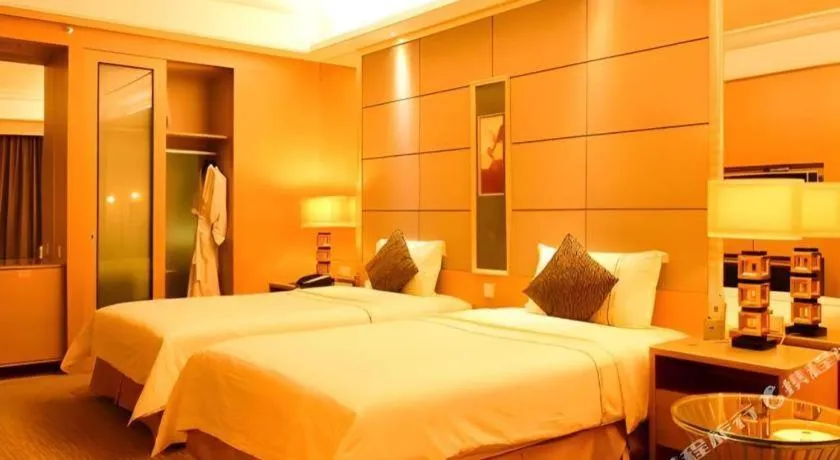 Bed in Wellton International Hotel