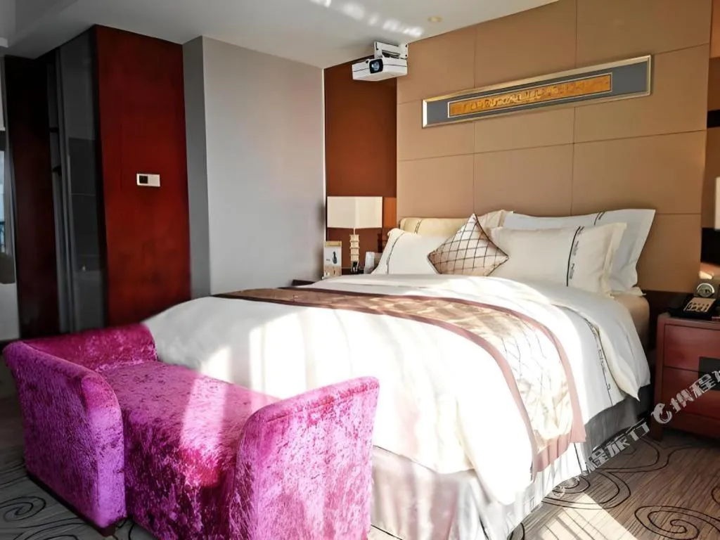 Bed in Wellton International Hotel