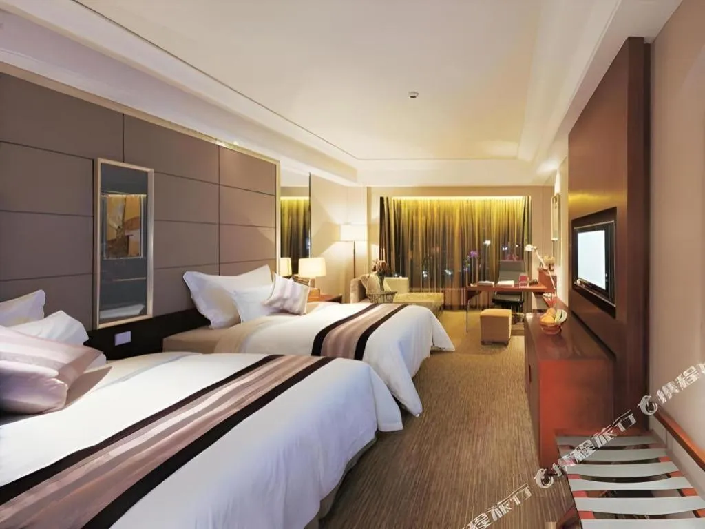 Bed in Wellton International Hotel