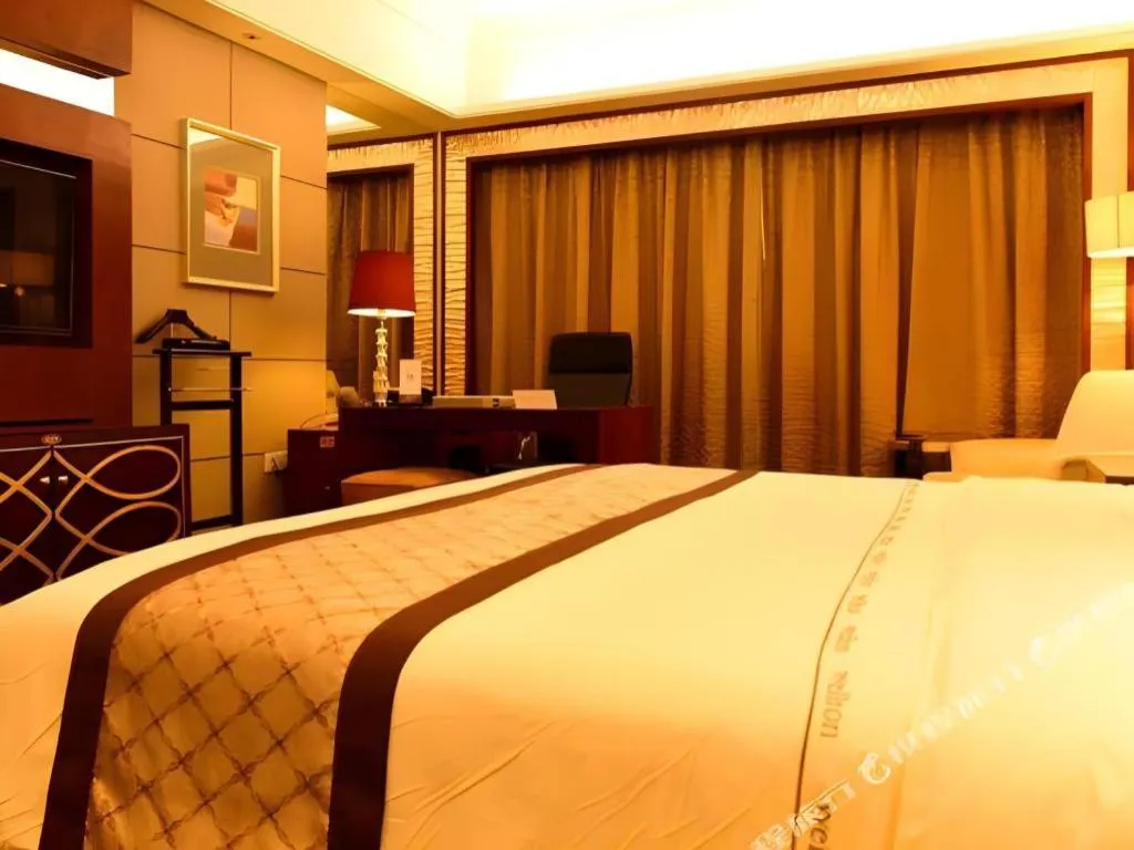 Bed in Wellton International Hotel