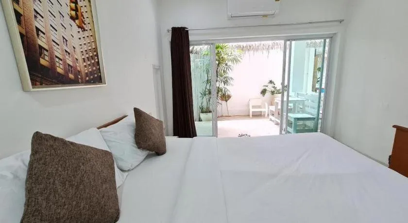 Bed in Sawasdee Coco Resort