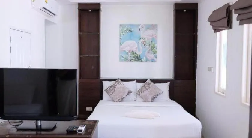 Bed in Sawasdee Coco Resort