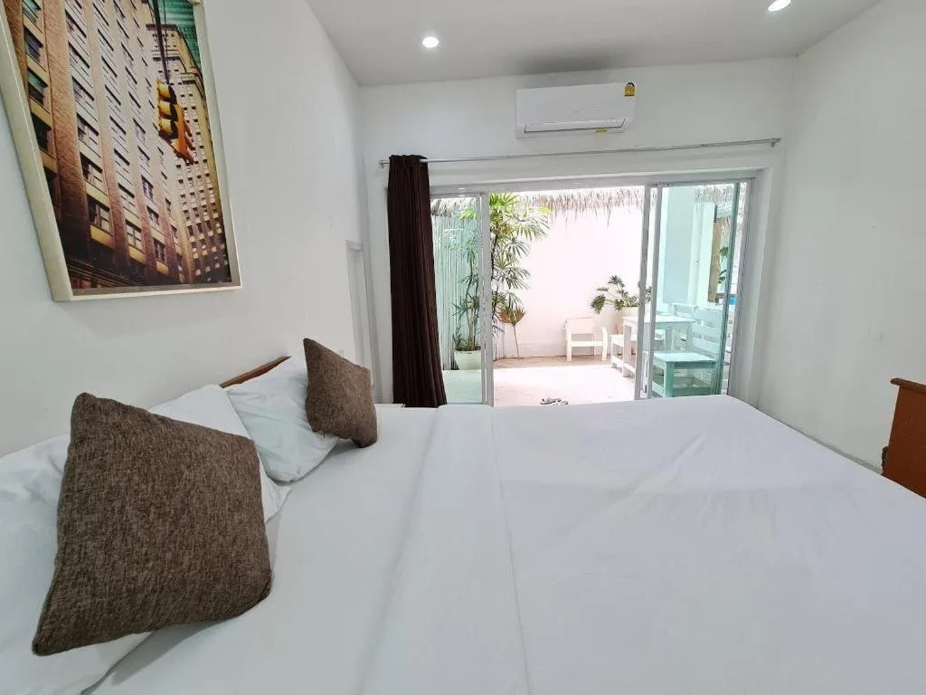 Bed in Sawasdee Coco Resort