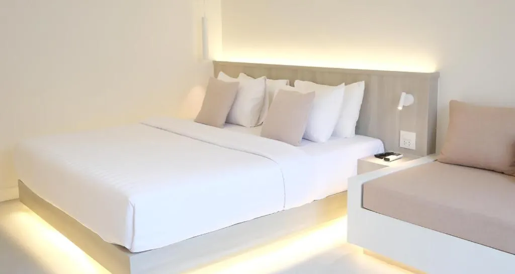 Bed in Sawasdee Coco Resort