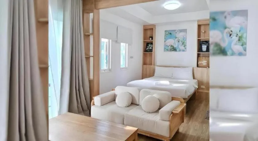 Bed in Sawasdee Coco Resort