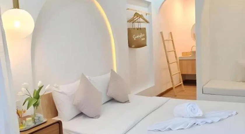 Bed in Sawasdee Coco Resort