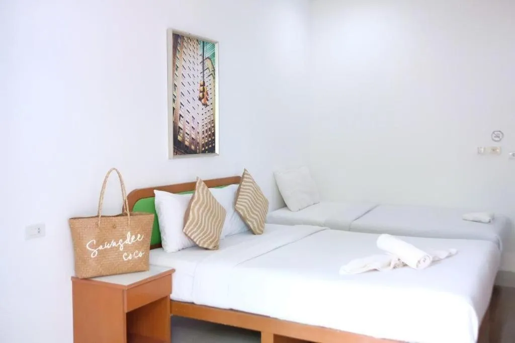 Bed in Sawasdee Coco Resort