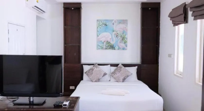 Bed in Sawasdee Coco Resort