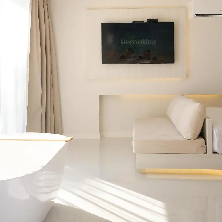 Bed in Sawasdee Coco Resort