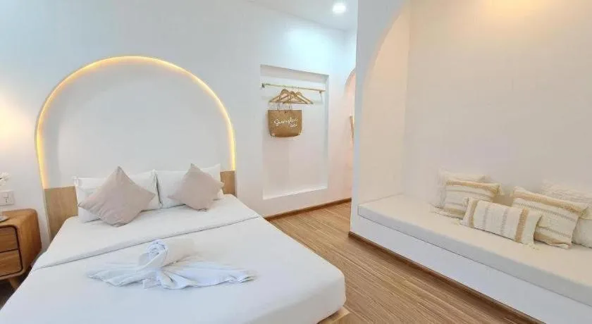 Bed in Sawasdee Coco Resort