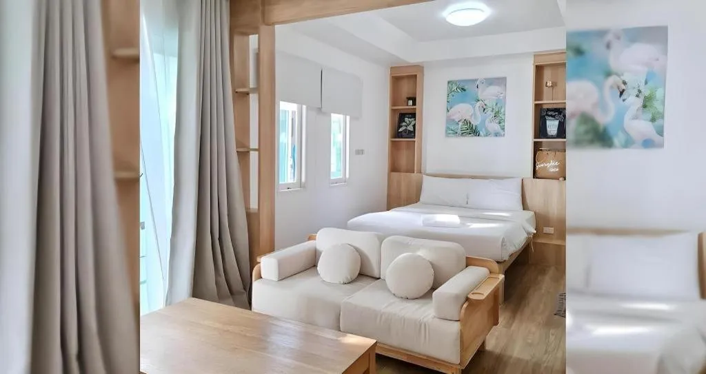 Bed in Sawasdee Coco Resort