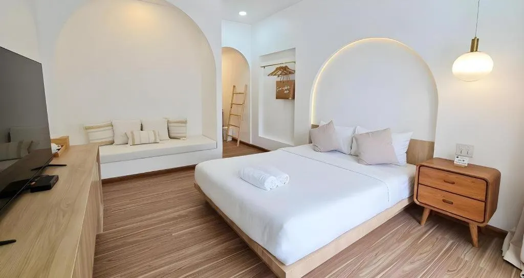 Bed in Sawasdee Coco Resort