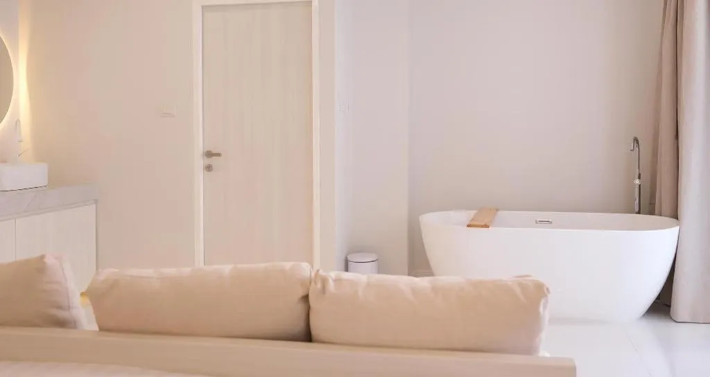 Bed in Sawasdee Coco Resort