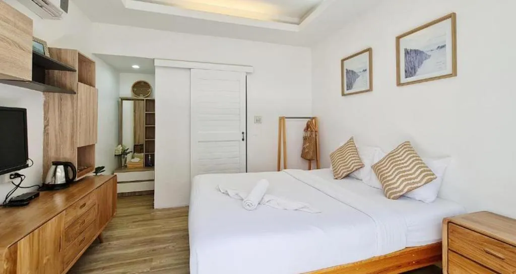 Bed in Sawasdee Coco Resort