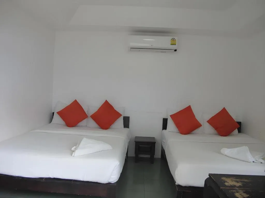 Bed in Sawasdee Coco Resort