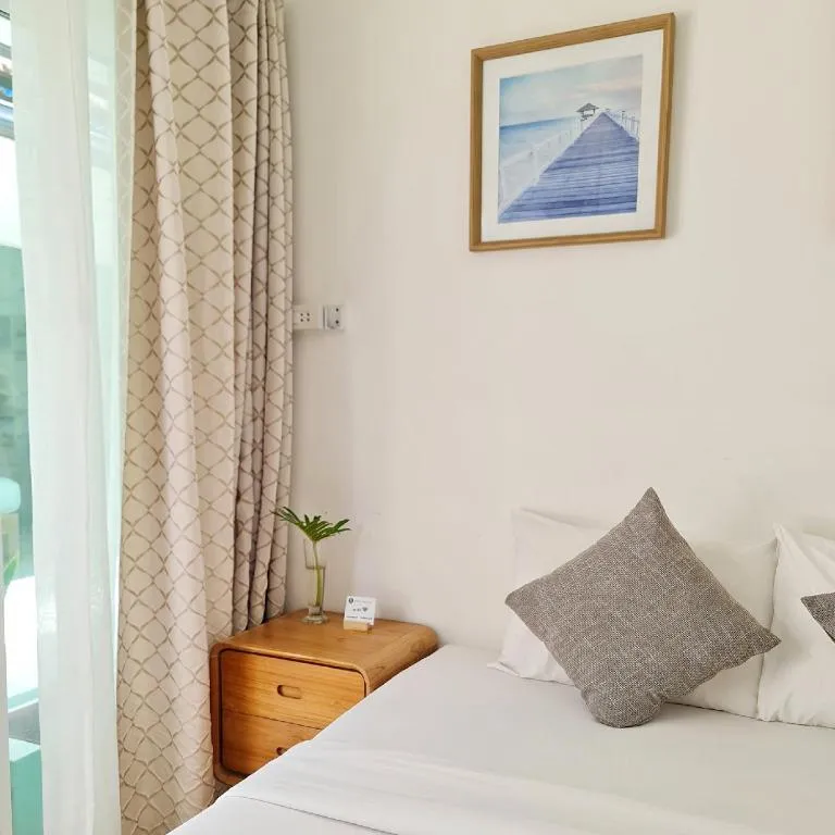 Bed in Sawasdee Coco Resort