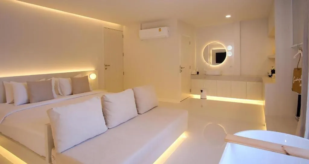 Bed in Sawasdee Coco Resort